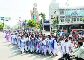 Practice over: Rehearsal for the Independence Day function has begun at the sports stadium in Bathinda. The pictures show schoolchildren at the Hanuman Chowk leaving after the practice session was over
