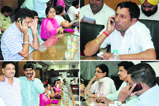 Deputy Mayor Sunil Talwar talks on the mobile phone as the election process was on at Mini-Secretariat in Panchkula on Monday. Tribune Photos:Nitin Mittal; Councillor Satinder Singh; RK Singh, SDM; Councillor Ravi Kant Swami (right).