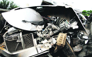 The mangled remains of the Honda City car which met with an accident on the Rohtak-Gohana highway near Brahmanwas village on Sunday night. 