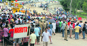 Kashmiri Pandits stage a protest in Jammu on Monday.