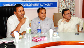 Minister for Urban Development Nawang Rigzin Jora chairs a meeting to review the progress of the Srinagar master plan.