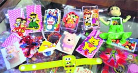 Rakhis with cartoon characters on display at a shop in Ludhiana