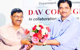 Dr KN Kaul, principal, DAV College, welcomes Arvind Ranade (right), scientist from Vigyan Prasar,  during the workshop at DAV College in Amritsar on Tuesday