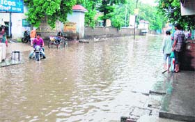 Rainwater accumulated at the entrance to Civil Hospital in Amritsar on Tuesday