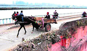 The British era Sonali Bridge on the Dhanauri-Roorkee stretch being used by commuters despite its dilapidated condition.