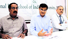 Prof Venkata Rao, Vice-Chancellor of National Law University, Bangalore, (centre) addresses mediapersons in Dehradun on Tuesday.