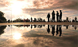 People enjoy the sunset in Shimla
