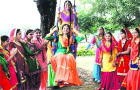 Swinging time: Students of St Soldier Degree College celebrate Teej in Jalandhar on Tuesday