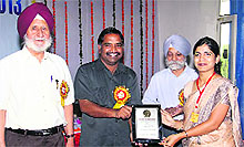 Vashishtha, assistant professor at Model Institute of Engineering and Technology, J&K , receives the Best Teachers Award at the ISTE (Indian Society for Technical Education) during a function at Hoshiarpur, Punjab