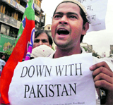 A BJP activist protests against the killing of Indian soldiers, in Kolkata on Tuesday.