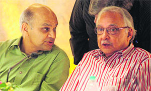 PS Bhatnagar (right) chairman of the Fourth Delhi Finance Commission interacts with Adviser to UT Administrator KK Sharma in Chandigarh on Wednesday.