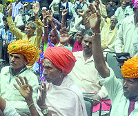 Activists of Right to Food stage a dharna for the amendments to the National Food Security Ordinance at Jantar Mantar in New Delhi on Wednesday