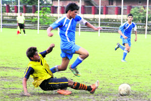 Players in action during the CBSE Sahodaya School Complex Inter-School Football Tournament in Dehradun on Wednesday. 
