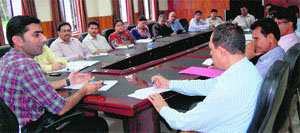 District Development Commissioner Shahid Iqbal Choudhary chairs a meeting of various departments in Reasi on Wednesday.