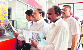 Parents stand in a queue to purchase prospectus for their wards at the Head Post Office in Ludhiana. 