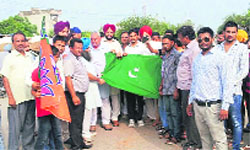 BJP Yuva Morcha activists hold a protest against the killing of Indian soldiers, at Doraha on Wednesday. 