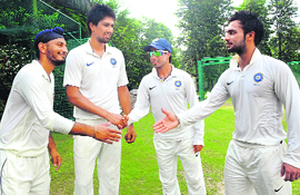 Jiwanjot Singh, Rahul Sharma, Sarabjit Ladda and Mandeep Singh congratulate each other on their selection to India A squads. 