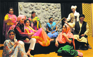 Artistes stage the play Sati at Tagore Theatre in Chandigarh on Thursday.