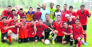 Players of St Stephen's School, Sector 45, strike a pose after winning the Inter-School Football Tournament for Boys (U-17) in Chandigarh on Thursday.