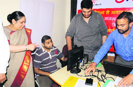Keshni Anand Arora, Deputy Director General, Unique Identification Authority of India, Chandigarh, inspects the special camp for the inmates of Samarth, a residential daycare centre at Sector 15, Chandigarh, on Thursday. 