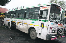 The bus that was hit by a train at a railway crossing in Dehradun on Thursday