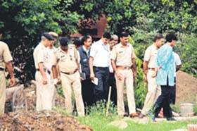 CBI officials at the crime scene where Geetanjali Garg was found murdered, in Gurgaon on Thursday