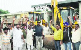 Members of Technical Workers Union of the Jalandhar Municipal Corporation staging a protest in support of their demand for immediate repair of faulty machines in Jalandhar on Thursday.