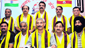Newly elected office-bearers of the Duggar Vikas Manch address mediapersons in Jammu on Thursday. 