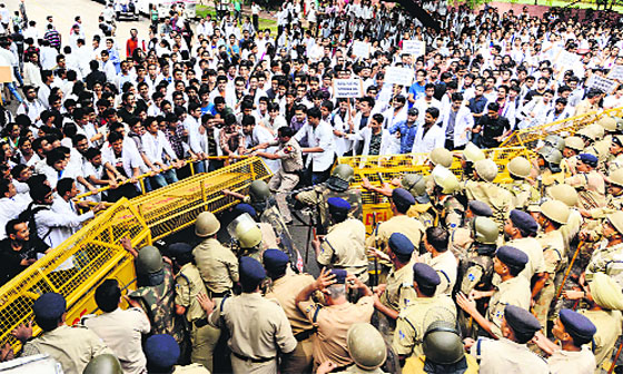 Medical students protest near Parliament in New Delhi on Thursday. 