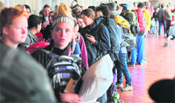 Travellers queue up to board their flights at the Jomo Kenyatta International Airport in Nairobi on Thursday after limited flights resumed. An inferno on Wednesday gutted the international arrivals area and international departure units 1 and 2 at the airport.  AFP