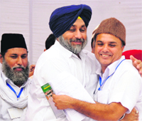 Deputy Chief Minister Sukhbir Singh Badal greets a member of the Muslim community on Eid-ul-Fitr in Bathinda on Friday. Tribune photo: Pawan Sharma