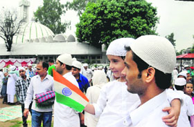 Muslims gather near the Sector 20 mosque to celebrate Id-ul-Fitr in Chandigarh on Friday. 