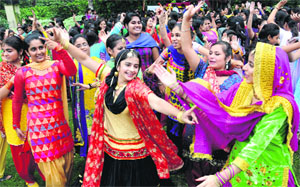 Girls performduring teej celebrations at Shri Guru Gobind Singh College for Women in Sector 26, Chandigarh. 