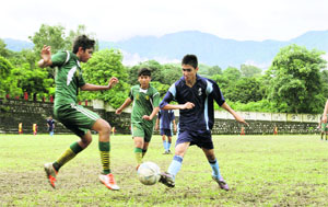 A semi final in progress during the CBSE Sahodaya School Complex Inter-School Football Tournament at Scholars' Home Ground, Dehradun, on Friday.