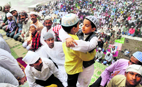 Children great each other on Eid-ul-Fitr in Shimla on Friday.