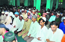 Devotees offer prayers in Jammu on Friday. 