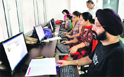 Elderly persons attend classes at a computer centre at Shri Geeta Mandir in Ludhiana.