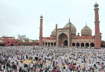 Muslims offer prayers on the occasion of Eid-ul-Fitr at Jama Masjid in New Delhi on Friday. 