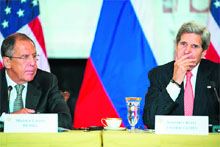 Russian Foreign Minister Sergey Lavrov (L) and US Secretary of State John Kerry in Washington on Friday. 