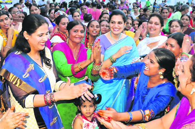 Celebration time: Army officers wives celebrate Teej with other women from the city at village Jaipalgarh in Bathinda on Saturday.