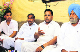 ABVP activists along with Bajrang Dal and VHP workers burn an effigy of the Central Government to protest against the violation of the Line of Control in Kishtwar area of Jammu and Kashmir by Pakistan in which five Indian soldiers attained martyrdom; (right) national general secretary of the Bahujan Samaj Party (BSP) Narendra Kashyap interacts with mediapersons.