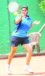 Komaljeet Kaur in action during the AITA Total Tennis Championship at The British School in Sector 70, Mohali, on Saturday. 