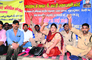  PRD jawans hold a dharna in support of their demands in Dehradun on Saturday.