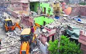 Rescue work in progress after a gas cylinder blast in a residential building in Jodhpur on Saturday.