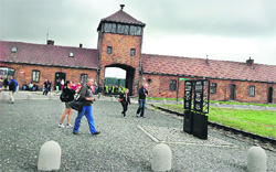 The entrance to Birkenau, or Auschwitz-II. About a million people visit the camps each year