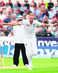 Stuart Broad celebrates after taking the wicket of Australian batsman Usman Khawaja on the second day of the fourth Ashes Test in Chester-le-Street on Saturday