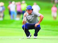 Jason Dufner lines up his putt on the 10th green during the second round of the PGA Championship on Friday