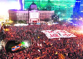 Unrest in South Korea: People hold a protest demanding an apology from South Korean President Park Geun-Hye and calling for the resignation of National Intelligence Service (NIS) chief Nam Jae-joon in Seoul on Saturday