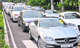 A car rally passes through the PU on Sunday