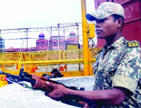A BSF jawan keeps vigil in front of Red Fort for the Independence Day in New Delhi on Sunday.